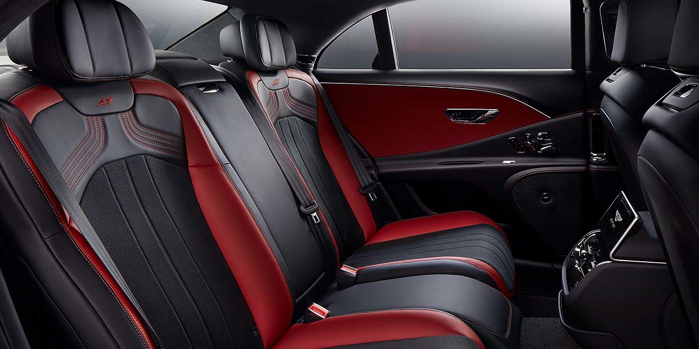 Exclusive Cars Vertriebs GmbH Bentley Flying Spur S sedan rear interior in Beluga black and Hotspur red hide with S stitching