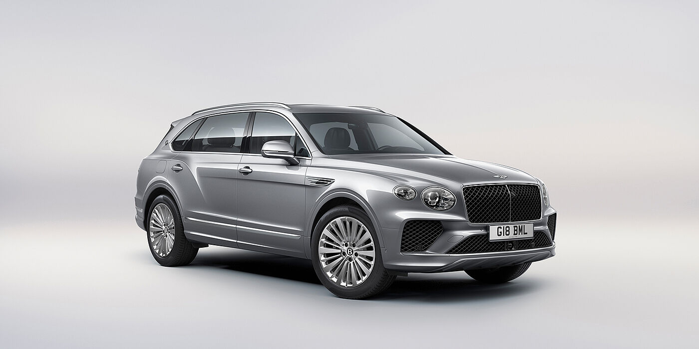 Exclusive Cars Vertriebs GmbH Bentley Bentayga Extended Wheelbase luxury SUV front three quarter view in Moonbeam paint with 21 inch five spoke painted wheels