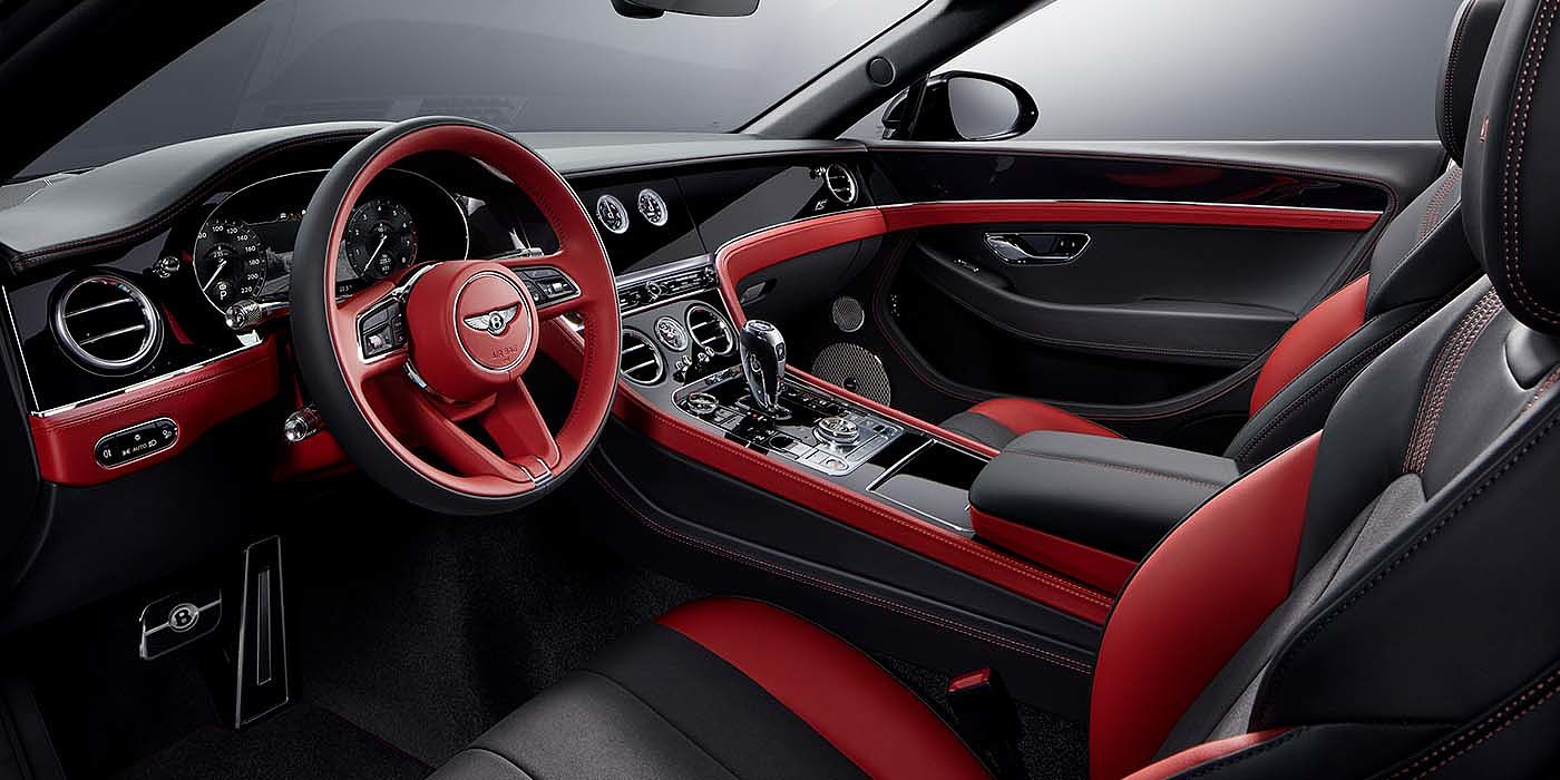 Exclusive Cars Vertriebs GmbH Bentley Continental GTC S convertible front interior in Beluga black and Hotspur red hide with high gloss carbon fibre veneer