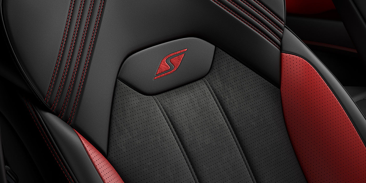 Exclusive Cars Vertriebs GmbH Bentley Bentayga S seat with detailed red Hotspur stitching and black Beluga coloured hide. 