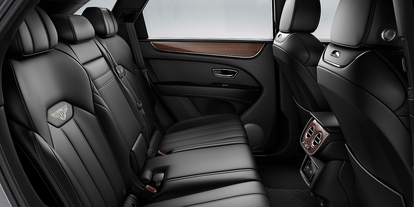 Exclusive Cars Vertriebs GmbH Bentey Bentayga interior view for rear passengers with Beluga black hide.