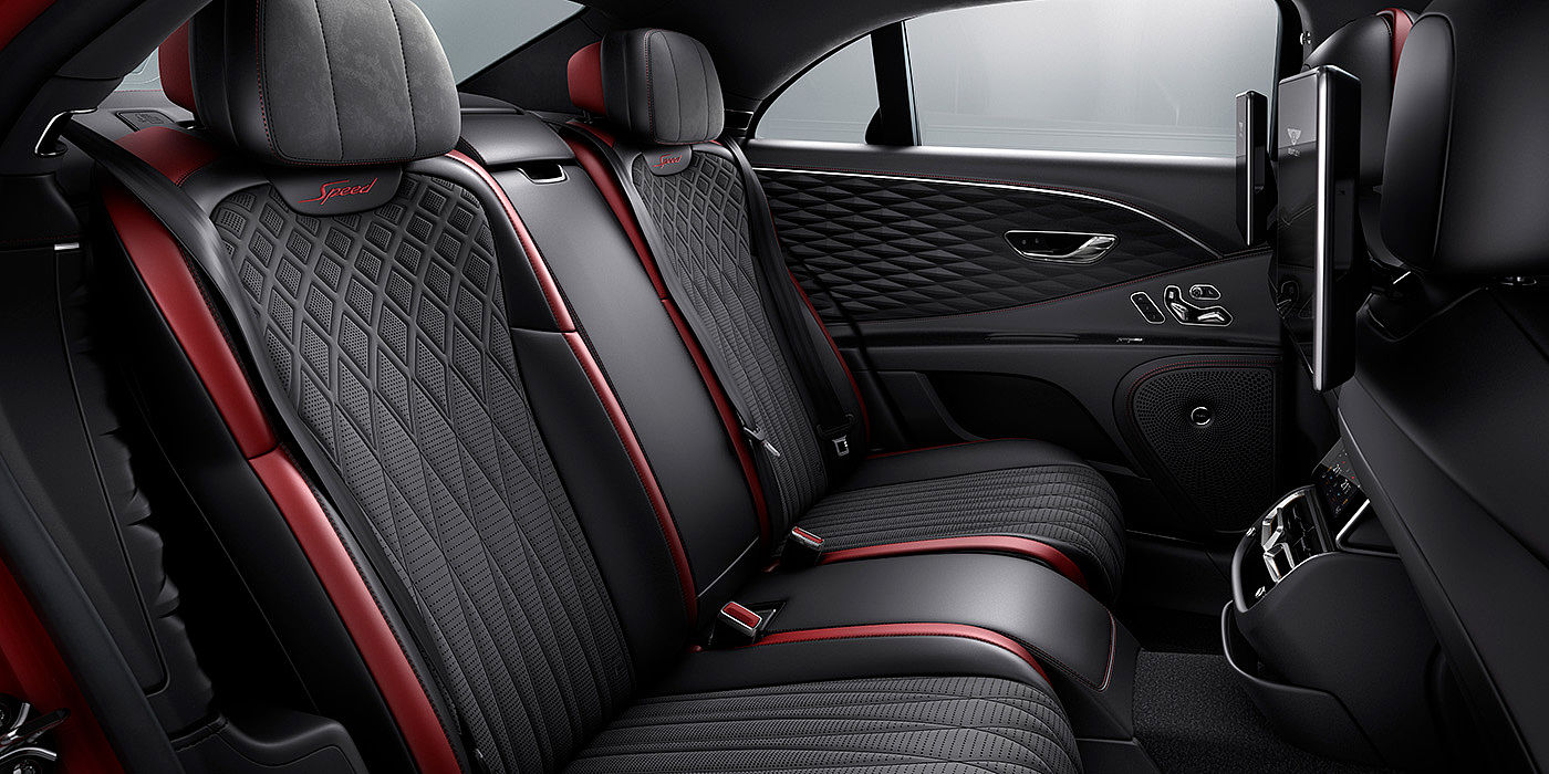 Exclusive Cars Vertriebs GmbH Bentley Flying Spur Speed sedan rear interior in Beluga black and Cricket Ball red hide