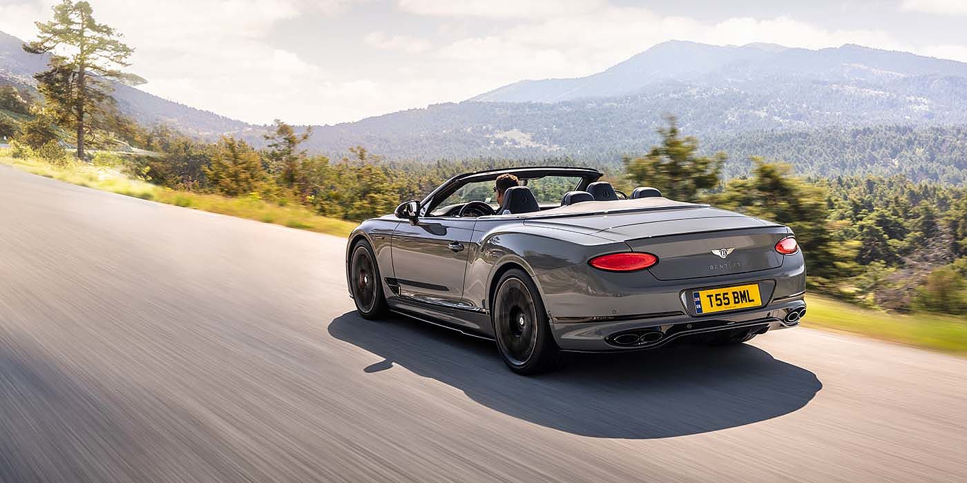 Exclusive Cars Vertriebs GmbH Bentley Continental GTC S convertible in Cambrian Grey paint rear 34 dynamic driving