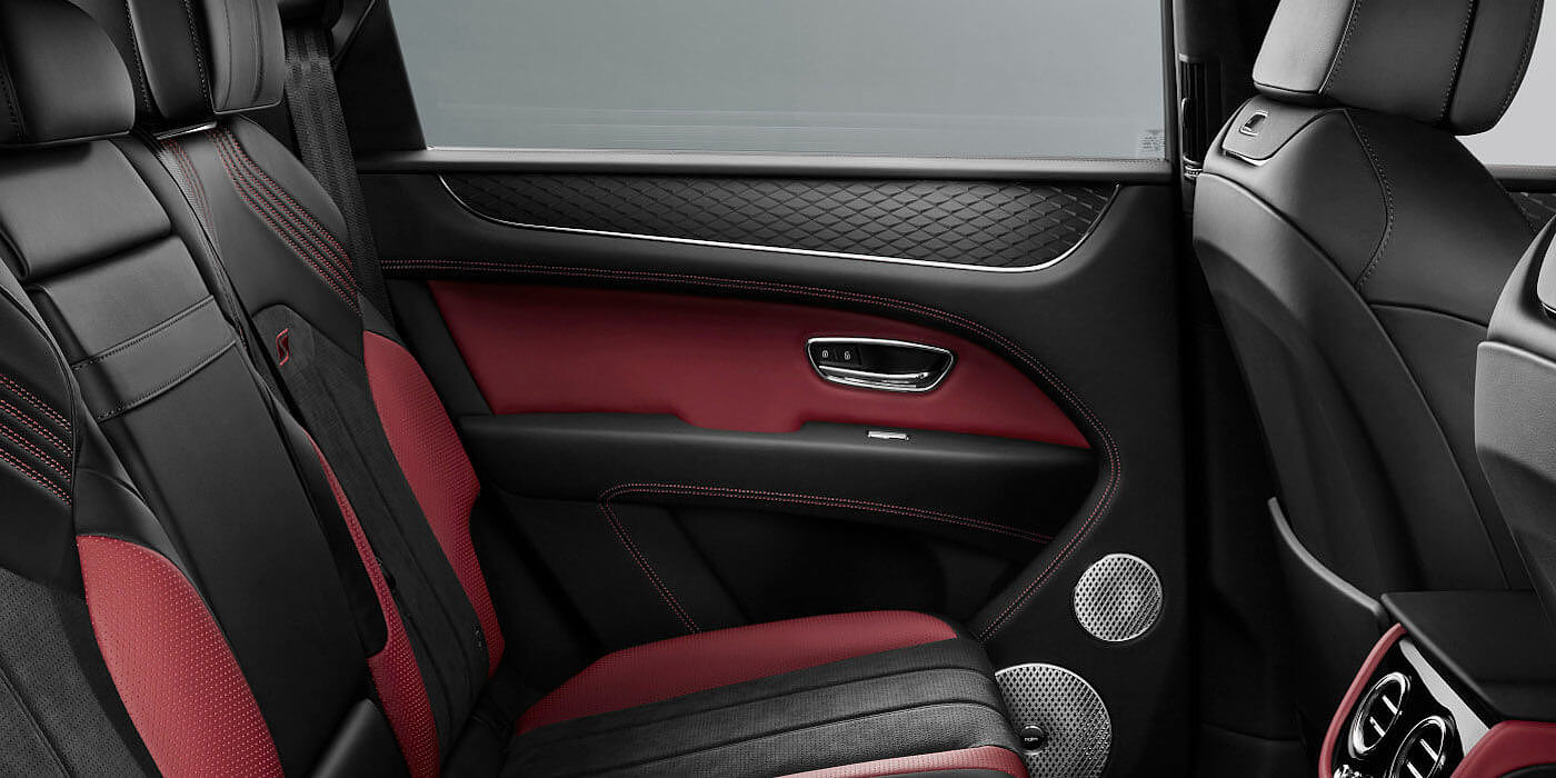 Exclusive Cars Vertriebs GmbH Bentley Bentayga S SUV rear interior in Beluga black and Hotspur red hide