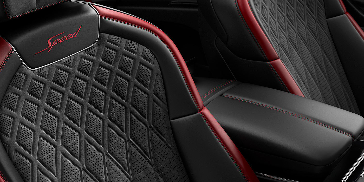Exclusive Cars Vertriebs GmbH Bentley Flying Spur Speed sedan seat stitching detail in Beluga black and Cricket Ball red hide