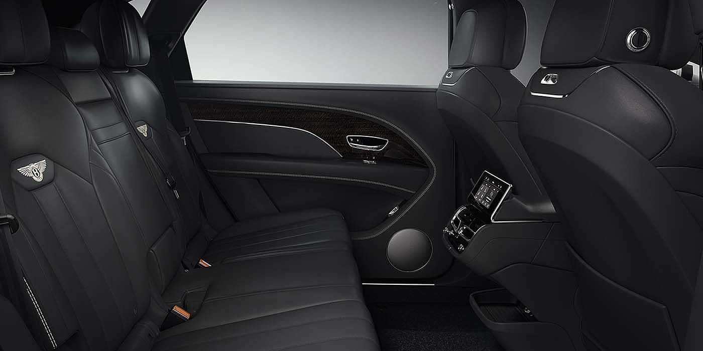 Exclusive Cars Vertriebs GmbH Bentley Bentayga EWB SUV rear interior in Beluga black leather
