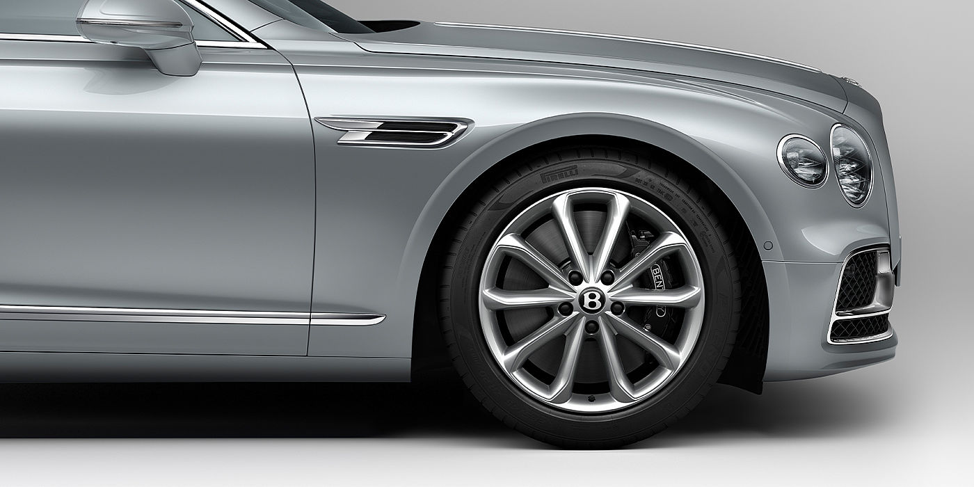 Exclusive Cars Vertriebs GmbH Bentley Flying Spur sedan in Moonbeam paint side close up