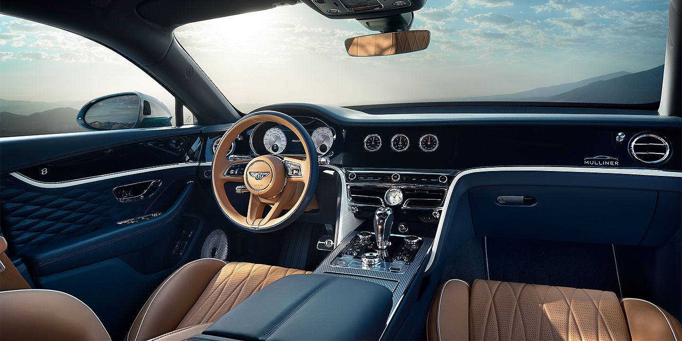 Exclusive Cars Vertriebs GmbH Bentley Flying Spur Mulliner sedan front interior in Camel and Imperial Blue hide
