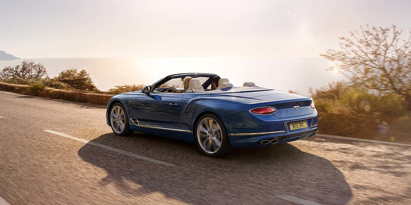 Exclusive Cars Vertriebs GmbH Bentley Continental GTC Azure convertible in Sequin Blue paint rear 34 dynamic