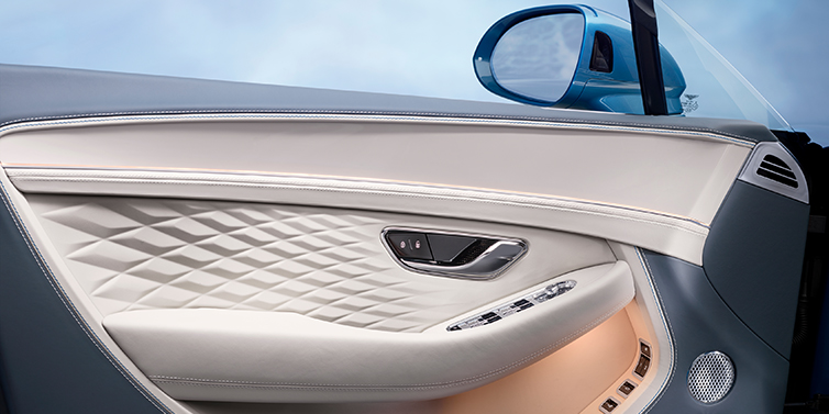 Exclusive Cars Vertriebs GmbH New Bentley Continental GT Azure coupe door interior featuring Linen and Brunel hides and Piano Linen veneer