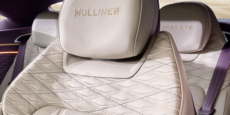 Exclusive Cars Vertriebs GmbH Bentley Continental GT Mulliner coupe seat detail in Linen leather with Mulliner Diamond in Diamond quilting and Mulliner embroidered seat emblem